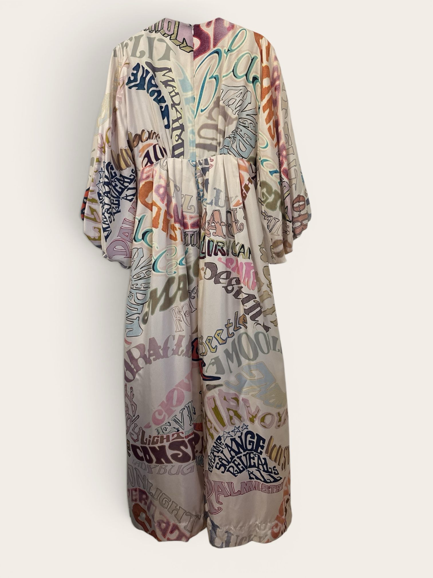 Sustainable Style Studio maxi dress with all-over artistic lettering print, balloon sleeves, and V-neckline. Flowing fabric in multicolor.