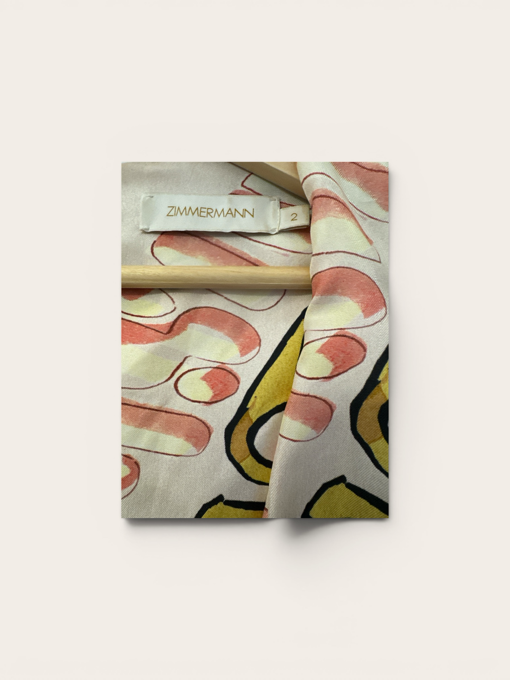 Sustainable Style Studio Zimmermann maxi dress with balloon sleeves, V-neck, and abstract print in pink, yellow, and black.
