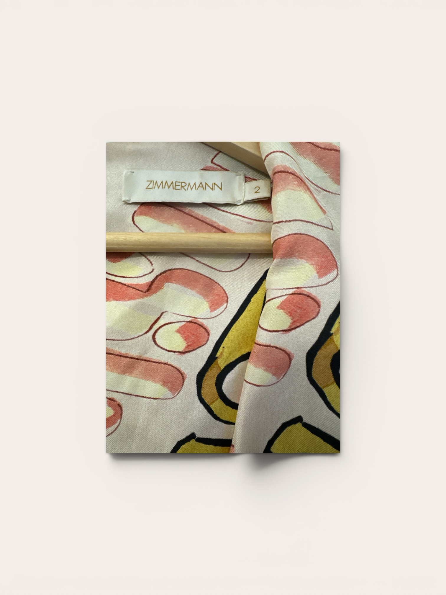 Sustainable Style Studio Zimmermann maxi dress with balloon sleeves, V-neck, and abstract print in pink, yellow, and black.